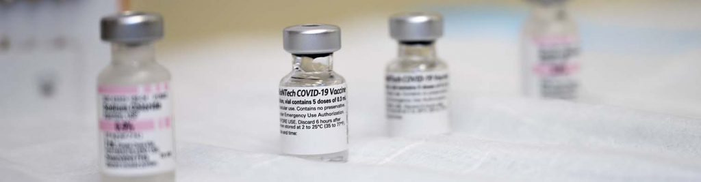 Several vials of vaccine.