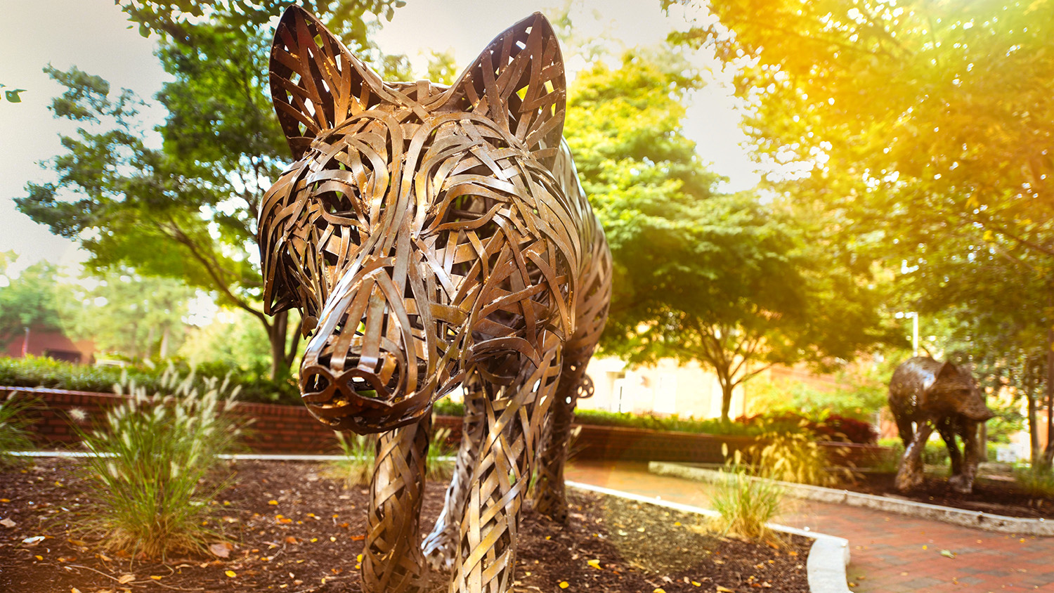 The copper wolves at Wolf Plaza near the Free Expression tunnel.