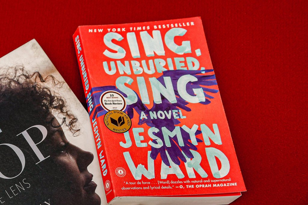 A copy of the book Sing, Unburied, Sing.