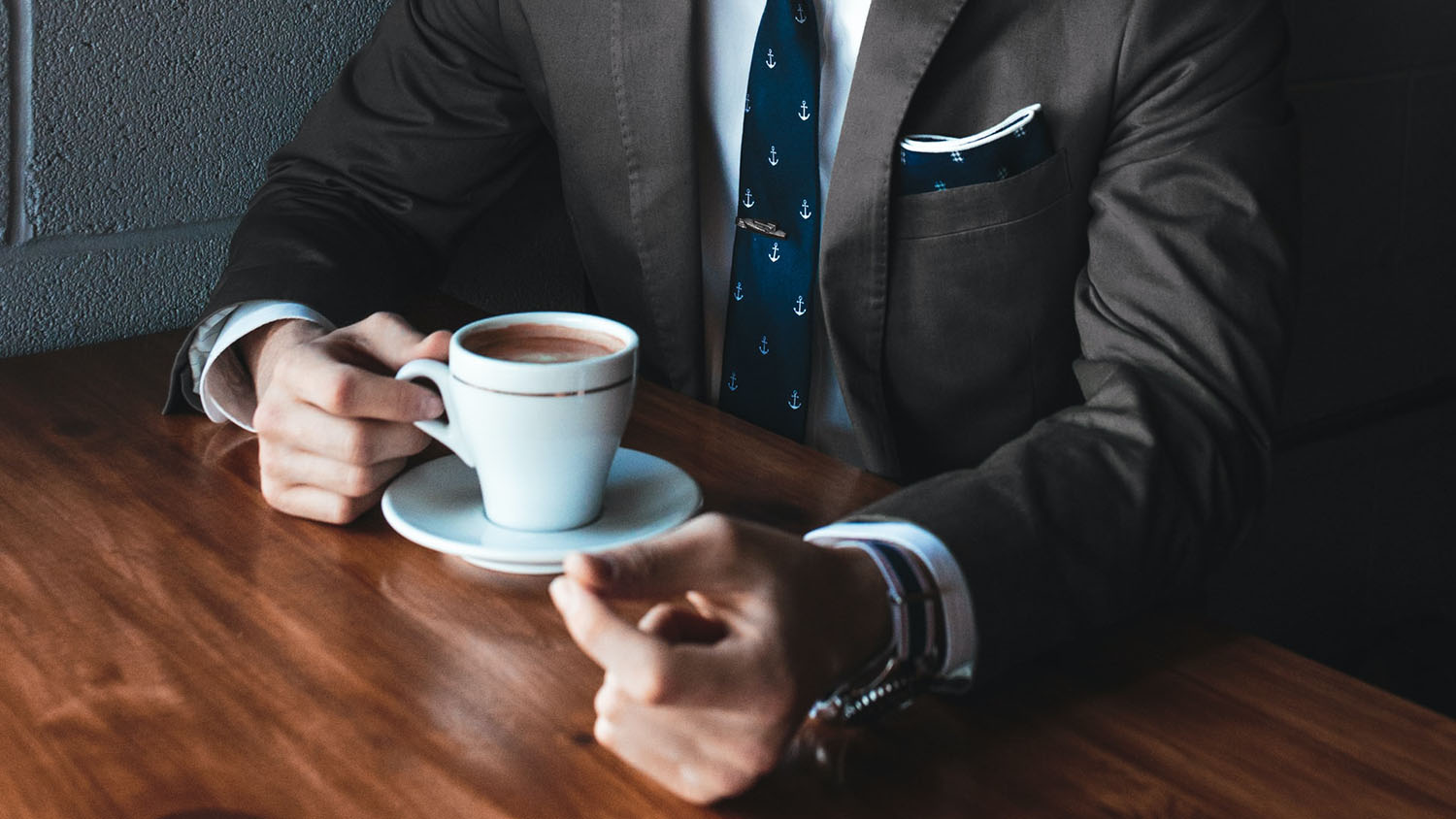 person with a cup of coffee