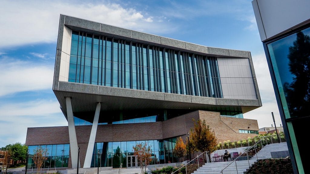 The exterior of Fitts-Woolard Hall on NC State's Centennial Campus on a sunny day.