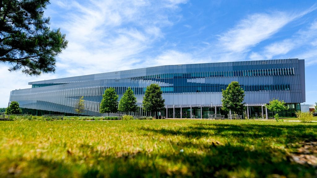 An exterior shot of the ultramodern Hunt Library on NC State's Centennial Campus.