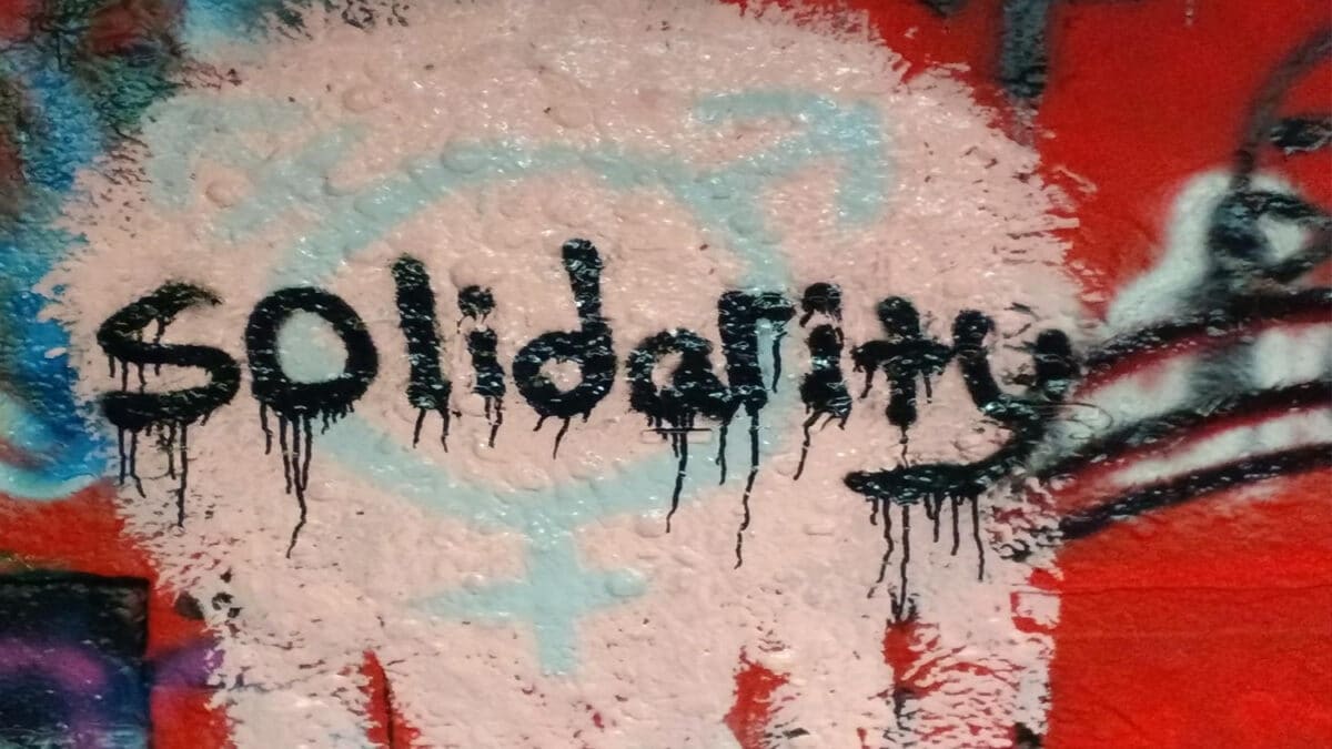 a graffiti tag with the word solidarity
