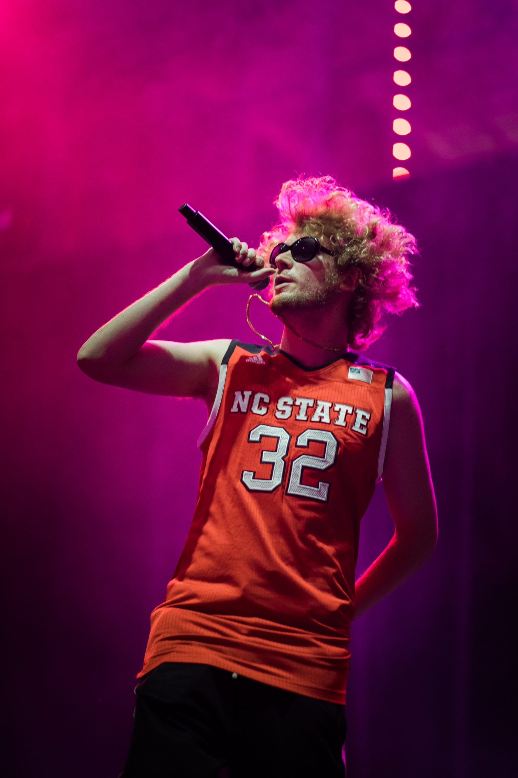 Yung Gravy performing in an NC State jersey. 