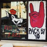 A window of a Hillsborough Street establishment painted to celebrate Red and White Week.