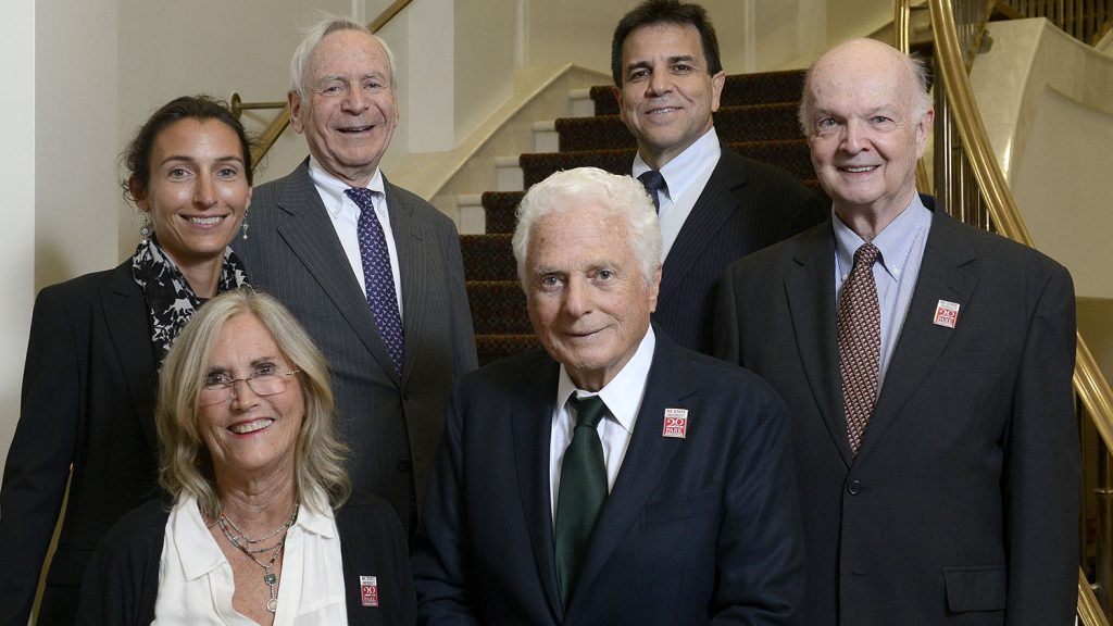 Members of the Board of Trustees of the Park Foundation pose at the Dorothy and Roy Park Alumni Center in 2016 for the 20th anniversary of the Park Scholarships program. Robb is in the center of the group.