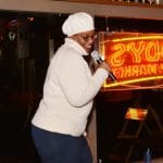 A woman sings karaoke