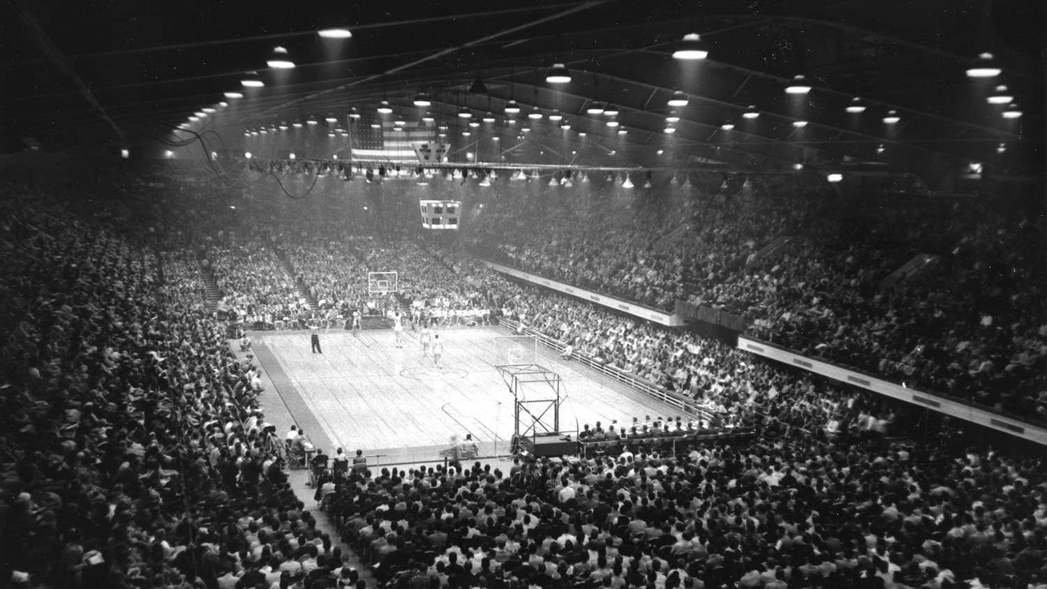 scene from a basketball game at Reynolds Coliseum in 1958