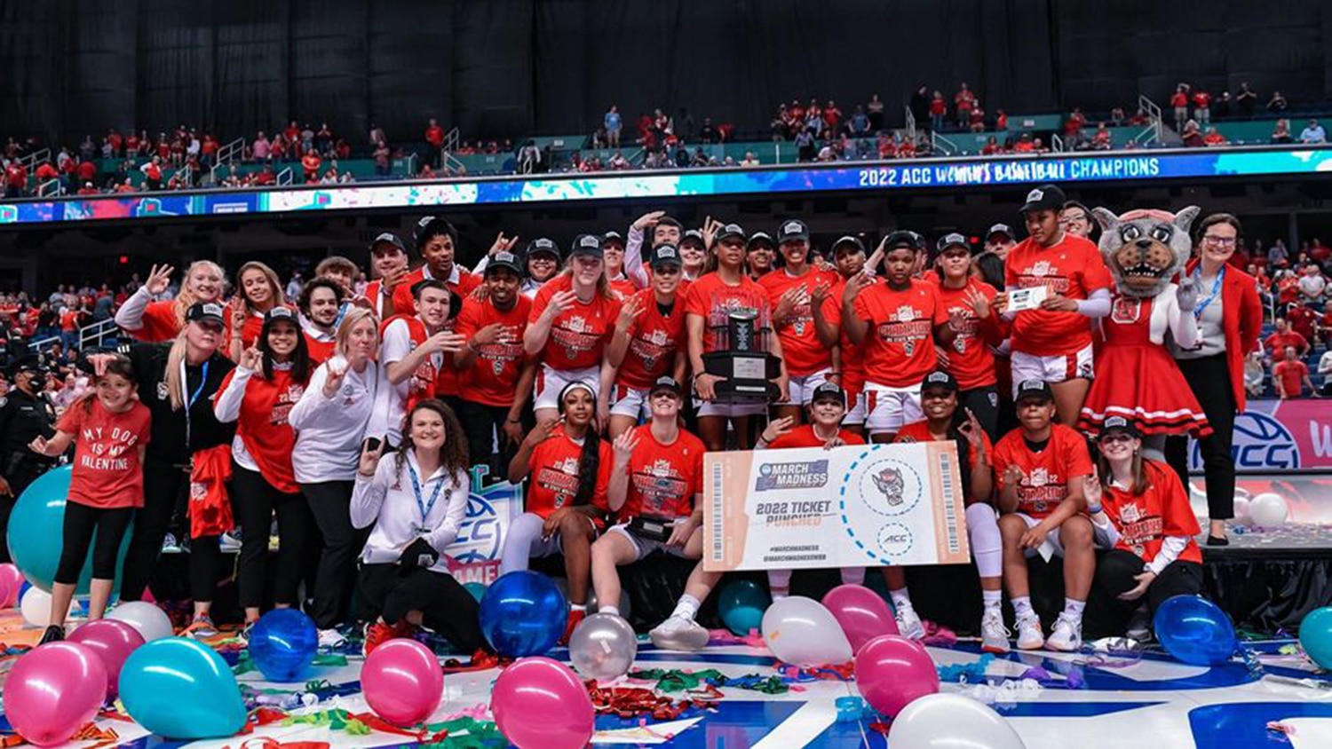 NC State women's basketball team poses together after winning the 2022 ACC Championship