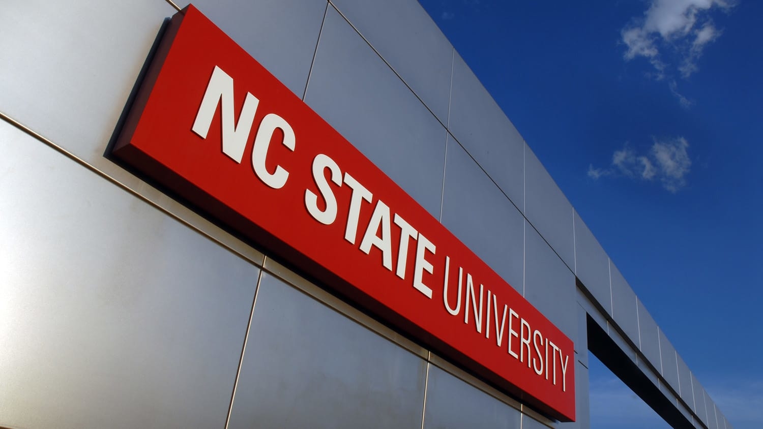 Campus gateway sign reading NC&#160;State University