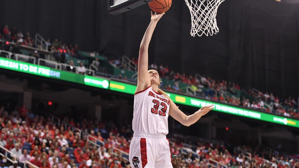 NC State's star center Alissa Cunane makes a layup during the 2022 ACC Championship finals.