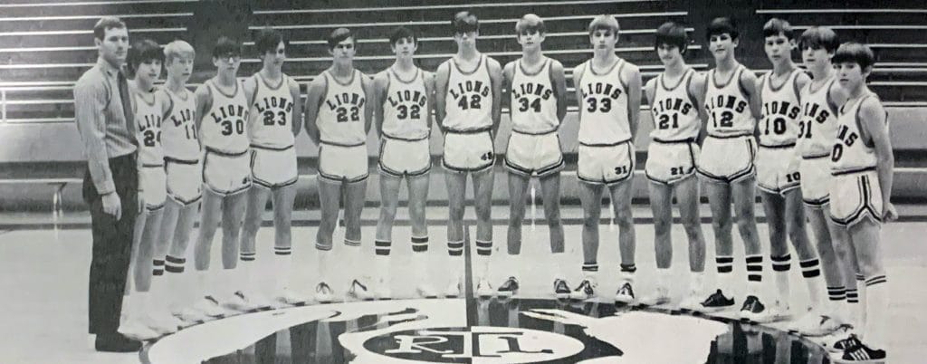 Wes Moore poses with his high school basketball team.