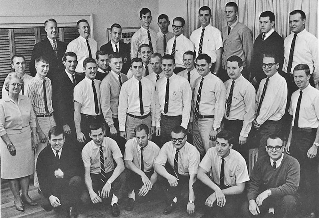 Mansour and his brother Youssef (back row, right) with fellow students in the FarmHouse fraternity.