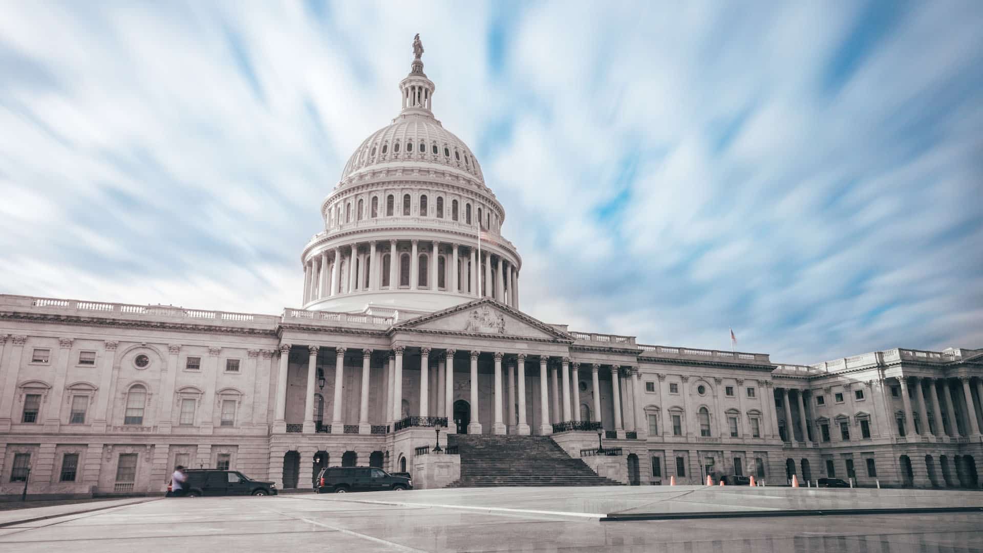 The U.S. Capitol building against a blue sky