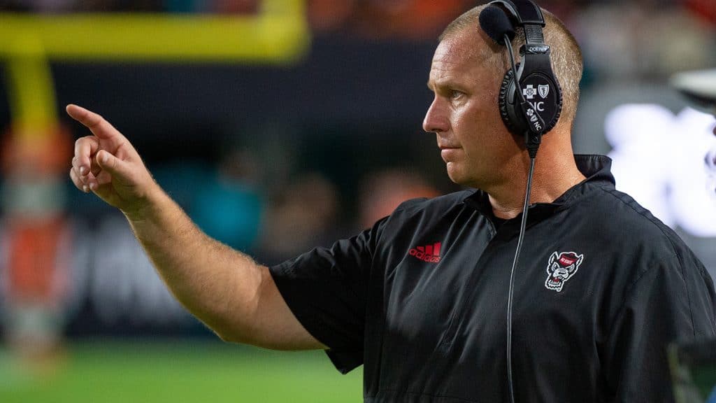 Head coach Dave Doeren on the sidelines at the at Hard Rock Stadium, where the Wolfpack took on the Miami Hurricanes in 2021.