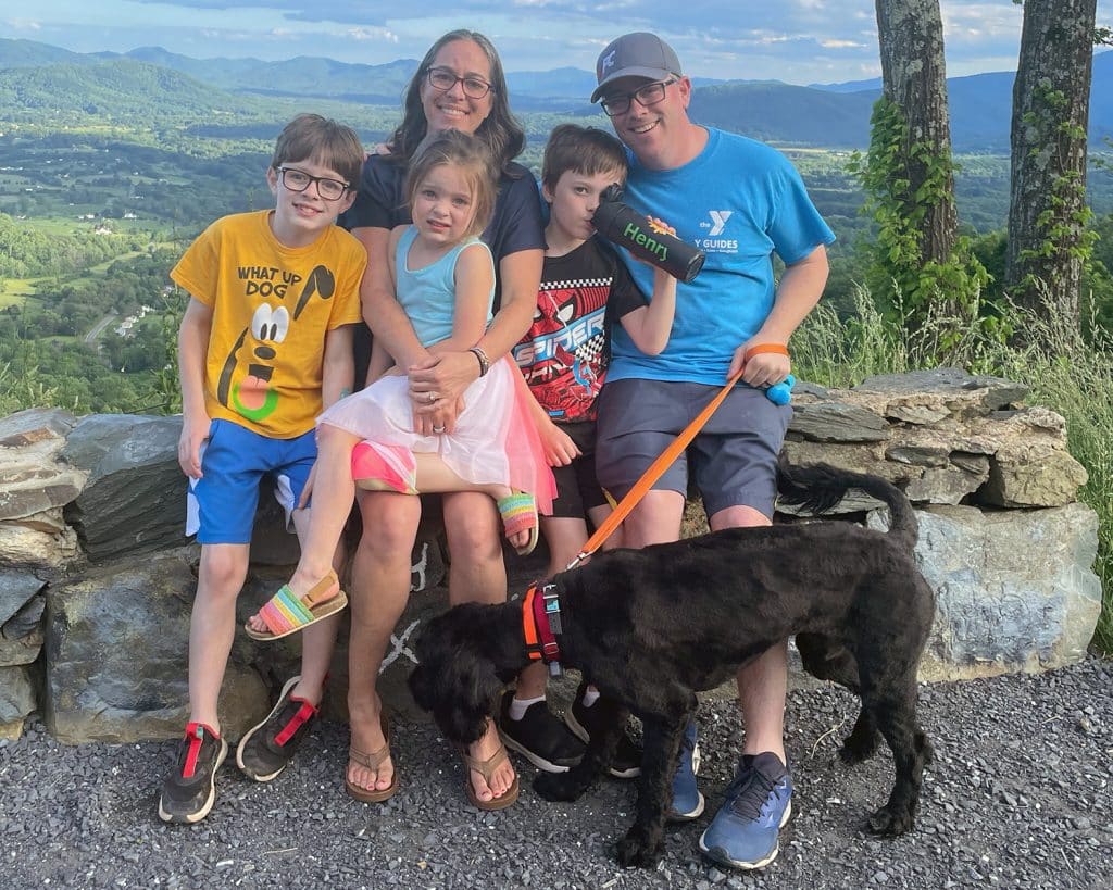 The Keane family poses at a national park.