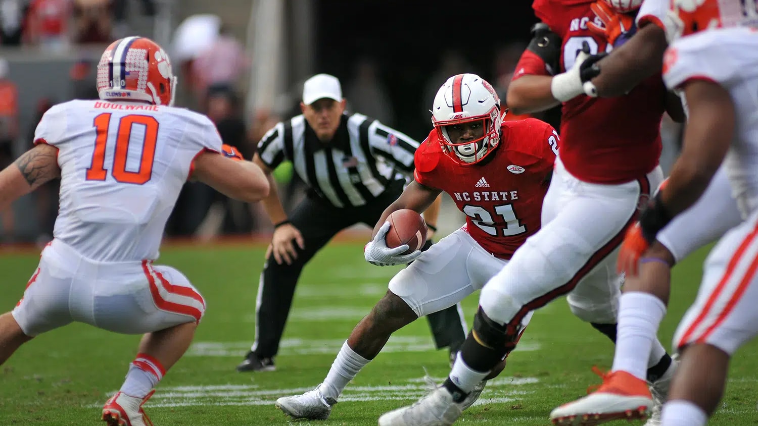 Running back Matthew Dayes looks up field during ACC football action against Clemson in Carter-Finley Stadium.