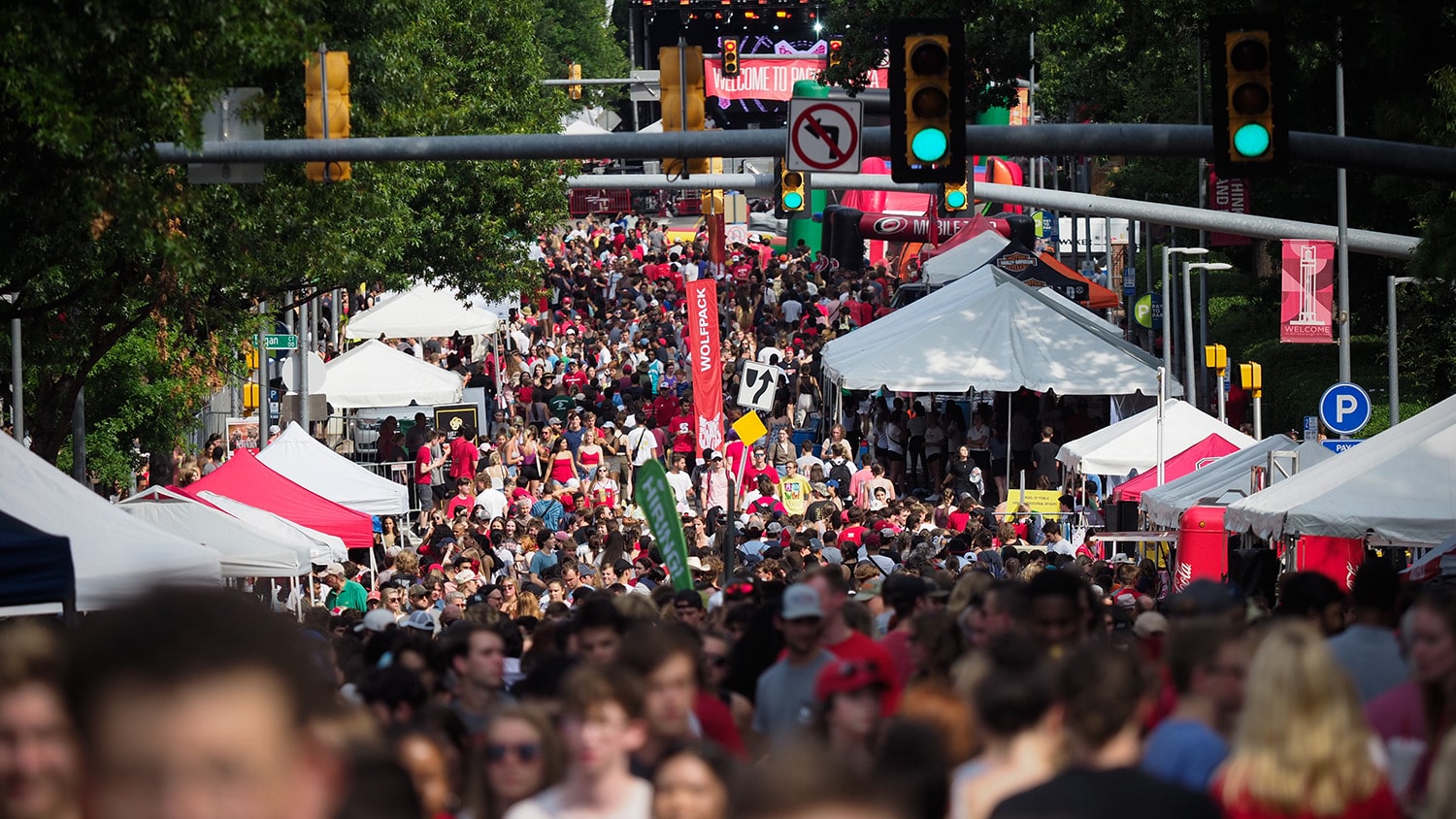 A sea of students and community members traverse Hillsborough Street during Packapalooza.