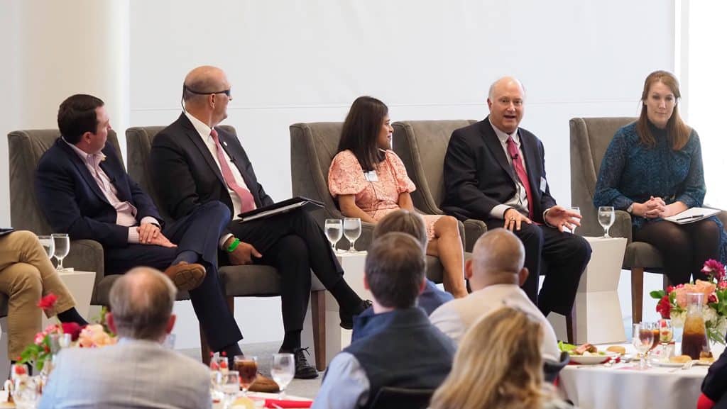 Palmour, second from right, joins business and state leaders at the College of Engineering’s Industry Day on Oct. 5.
