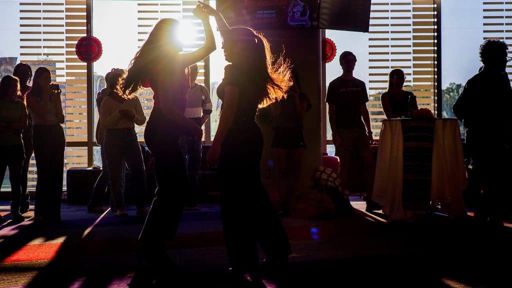 Students dance at a Sube Ritmo event during Latinx Heritage Month.