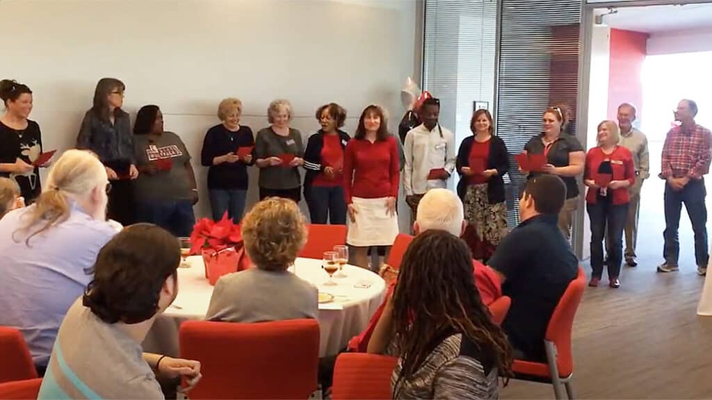 group of people singing together