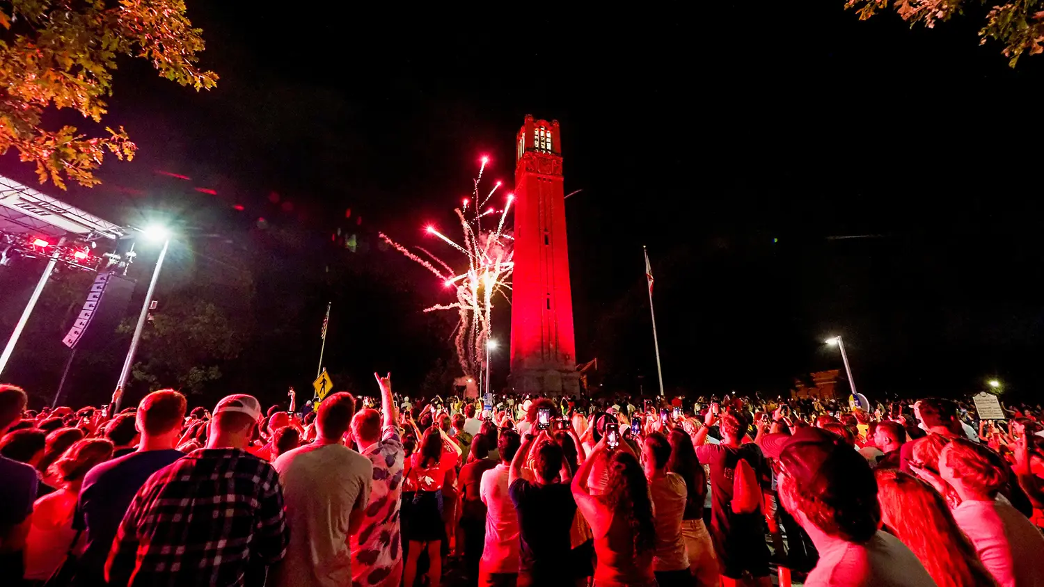 Red fireworks light up the sky above the Belltower as a dazzling end to Packapalooza 2022.