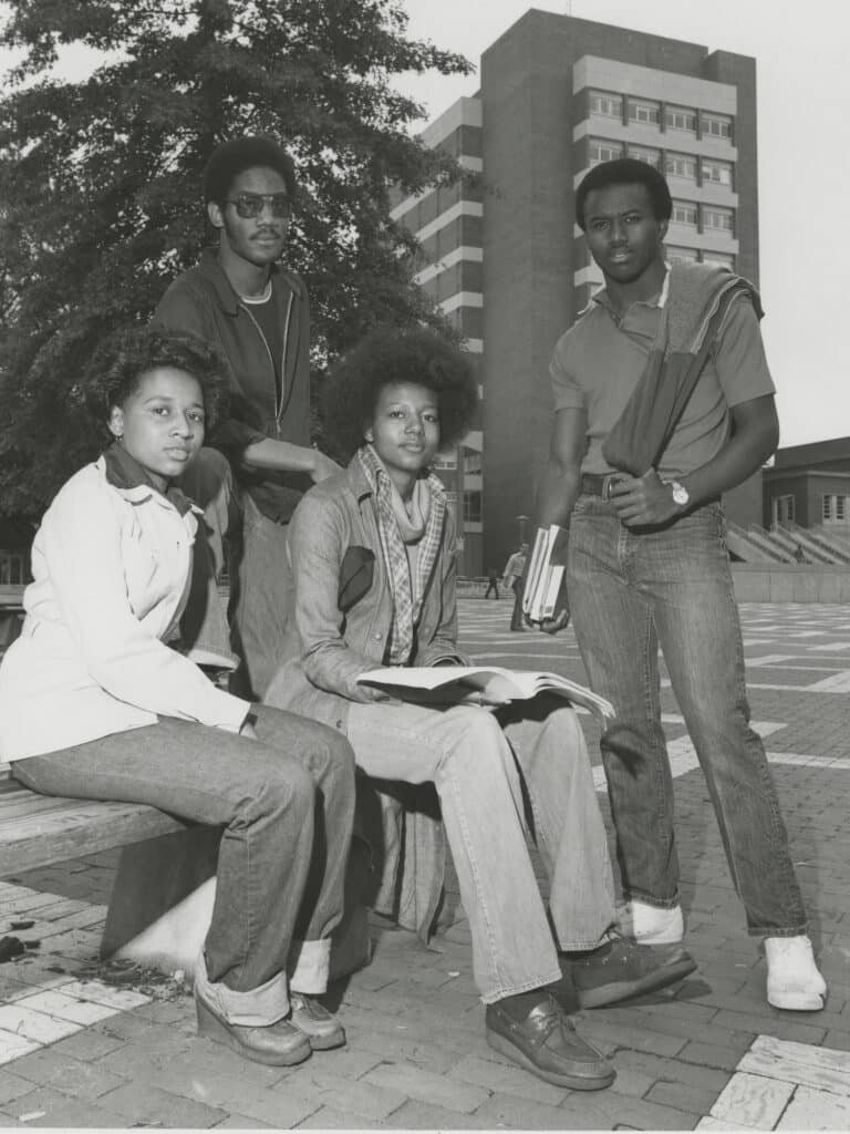 Ted Bush, Karen Wilkerson, Cynthia Hinnaut, and Mike Hunter on the NC State Brickyard in 1970.