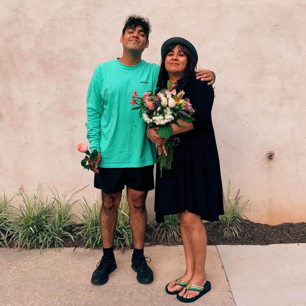 Saul Flores and his mother embrace.