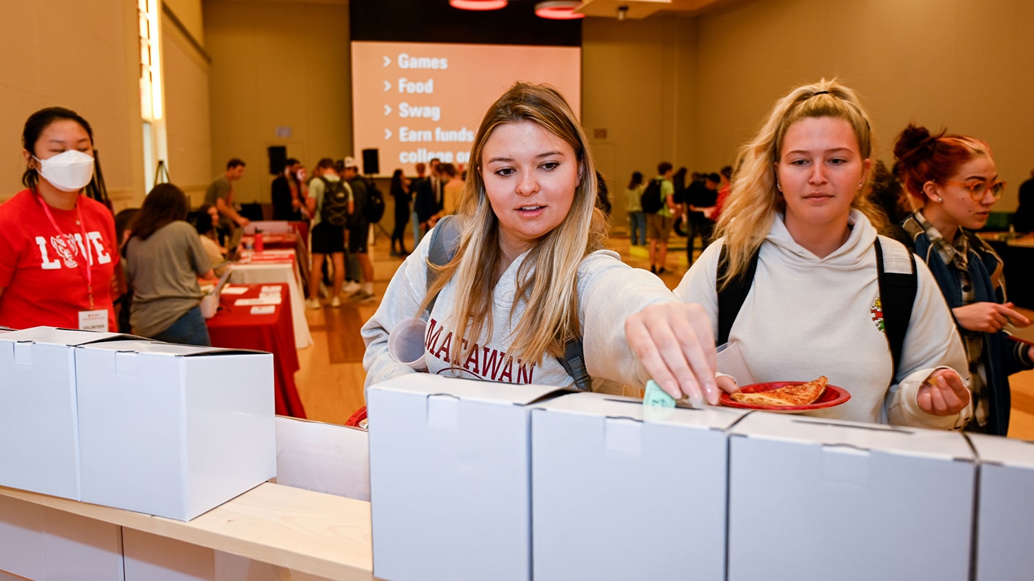 Students vote for their favorite units to win bonus funds during the 2022 Day of Giving student event