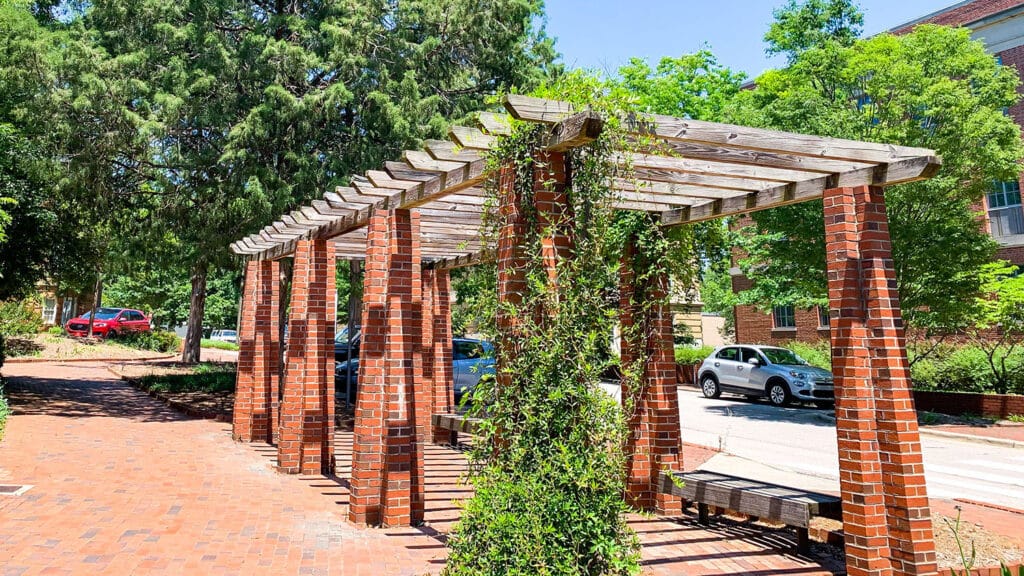 The SolarSpace pergola at Gardner Arboretum is a project of the Sustainability Stewards that gives NC State students a shaded place to study and socialize while charging devices with solar power.
