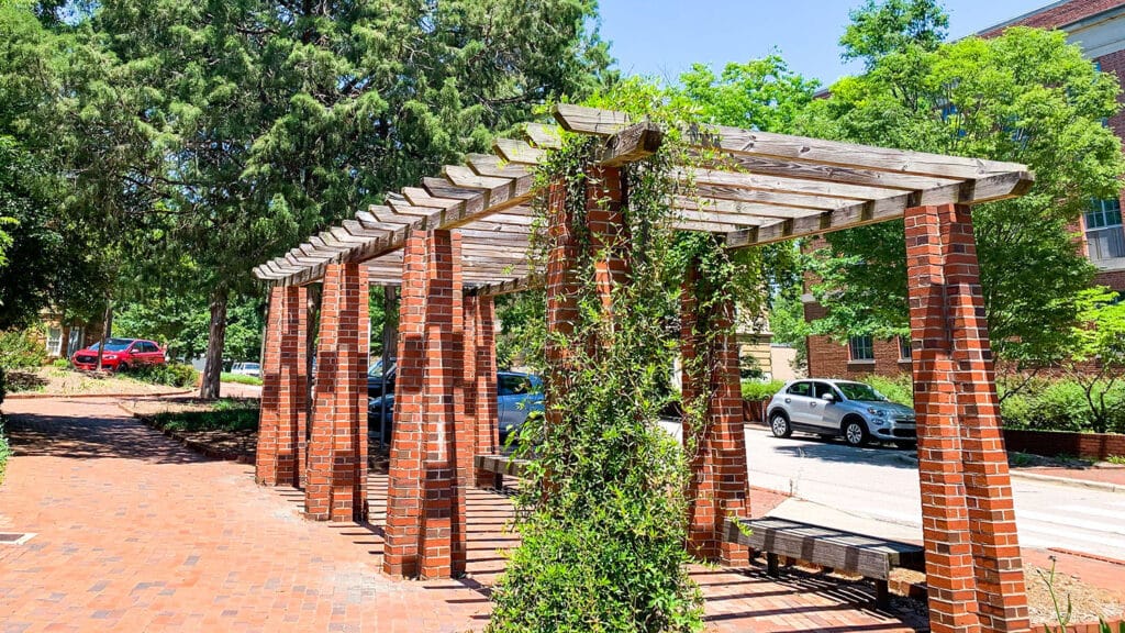 The SolarSpace pergola at Gardner Arboretum is a project of the Sustainability Stewards that gives NC State students a shaded place to study and socialize while charging devices with solar power.