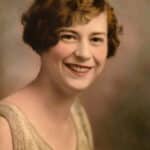 A sepia-toned portrait shows an early adolescent Mary Yarbrough smiling gleefully at the camera.