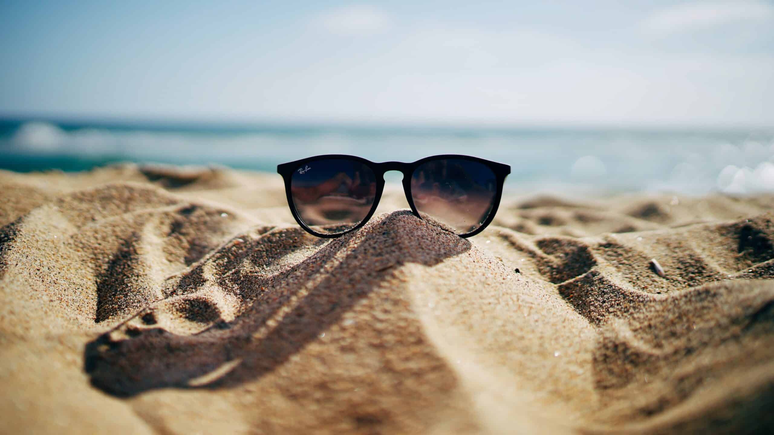 Sunglasses on a beach.