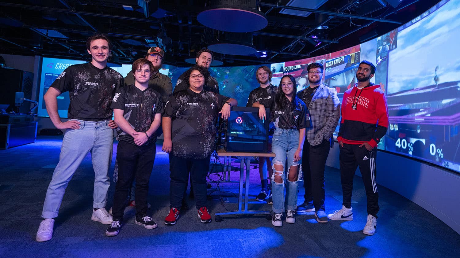 Members of the Esports Club pose for the camera in Hunt Library's Teaching and Visualization Lab.