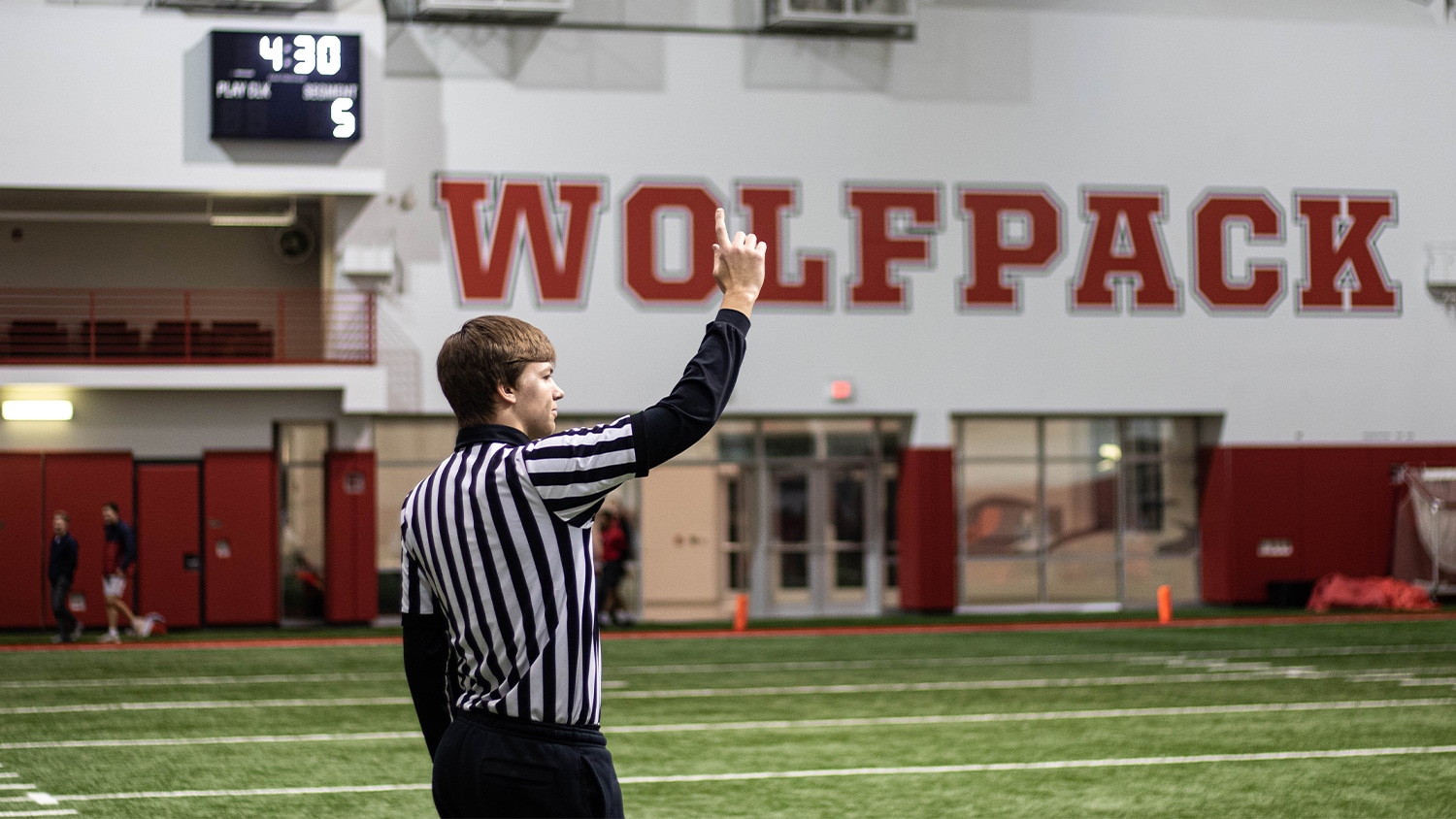 A student official makes a call during an intramural sport event