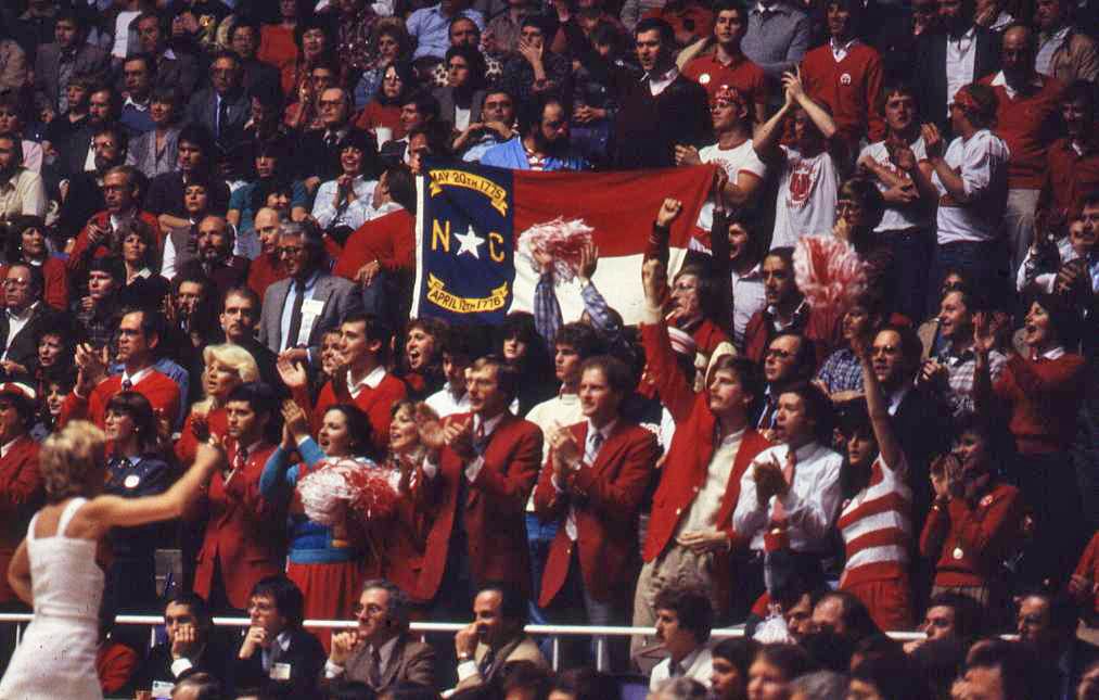 A crowd of Wolfpack fans in the stands at a game in 1983