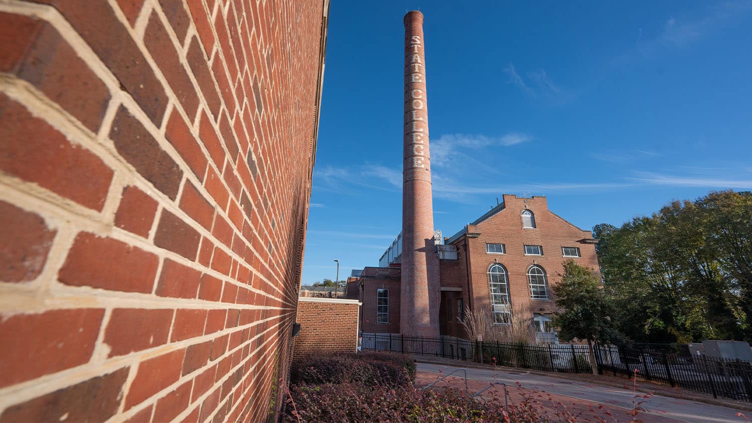 The historic brick smoke stack on central campus