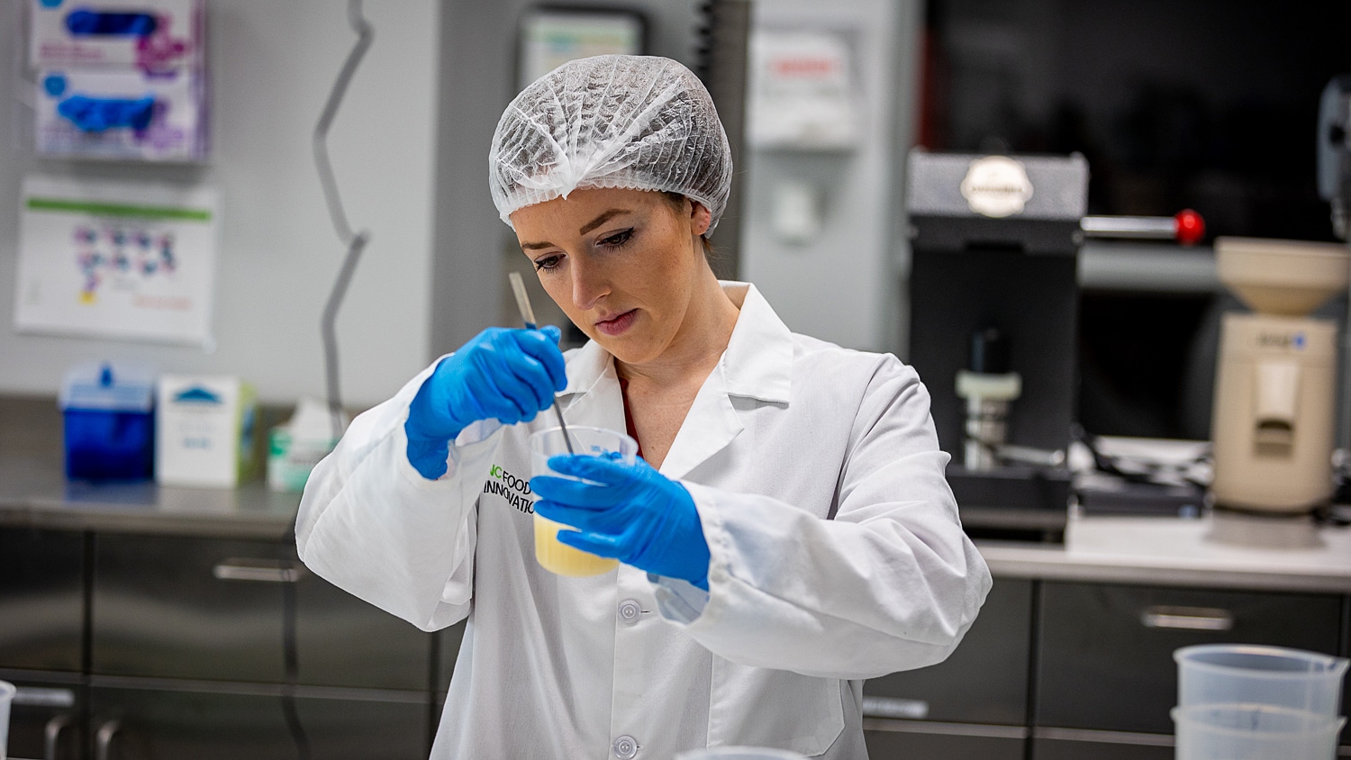 A food scientist hydrates a protein for use in a food formulation.