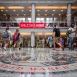 A view of the NC State seal on the floor in Talley Student Union, as student mill about during Wolfpack Welcome Week.