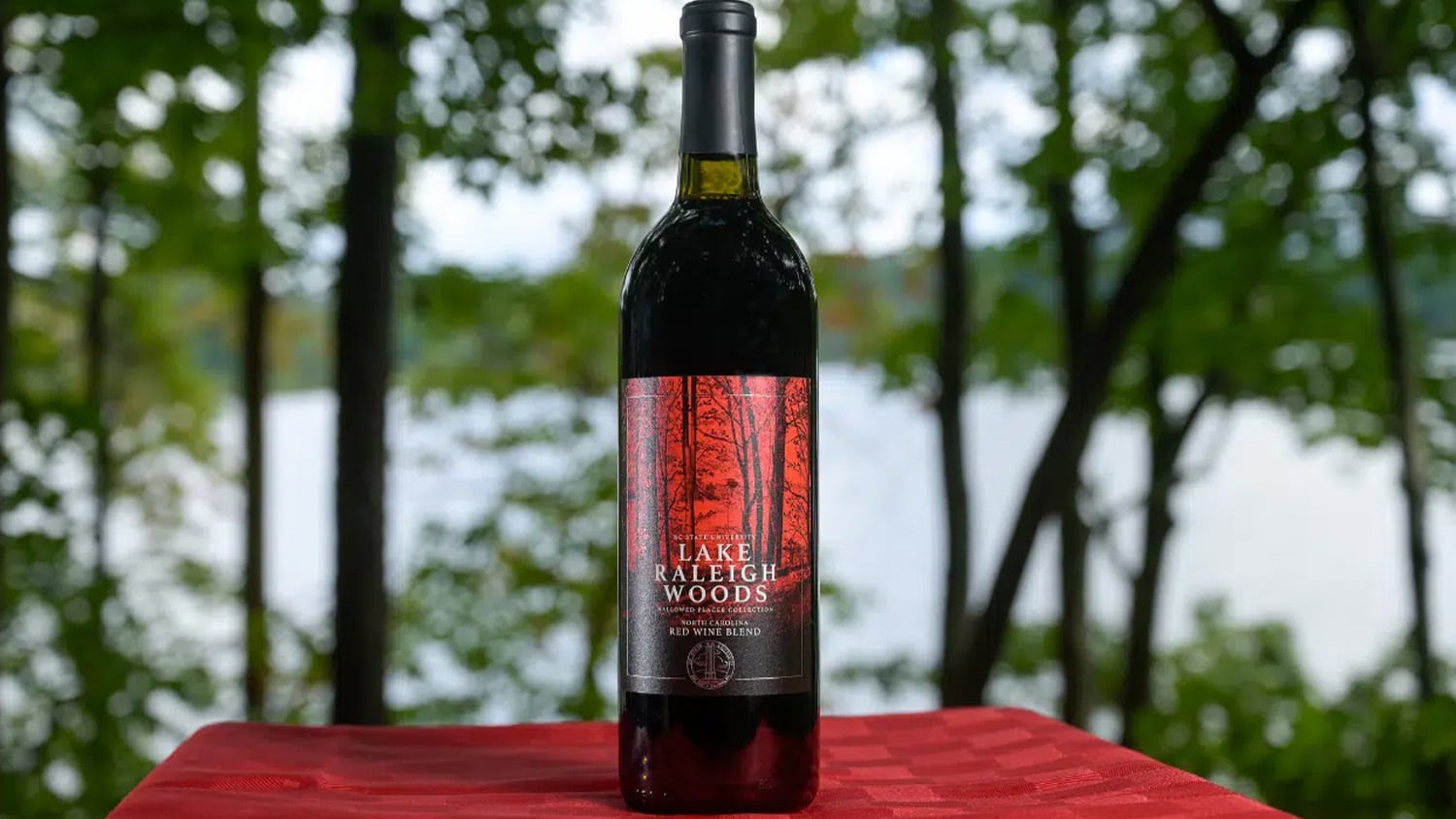 A bottle of the new NC State licensed wine inspired by Lake Raleigh Woods