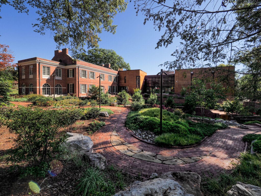 The lush, green back yard of the Gregg Museum