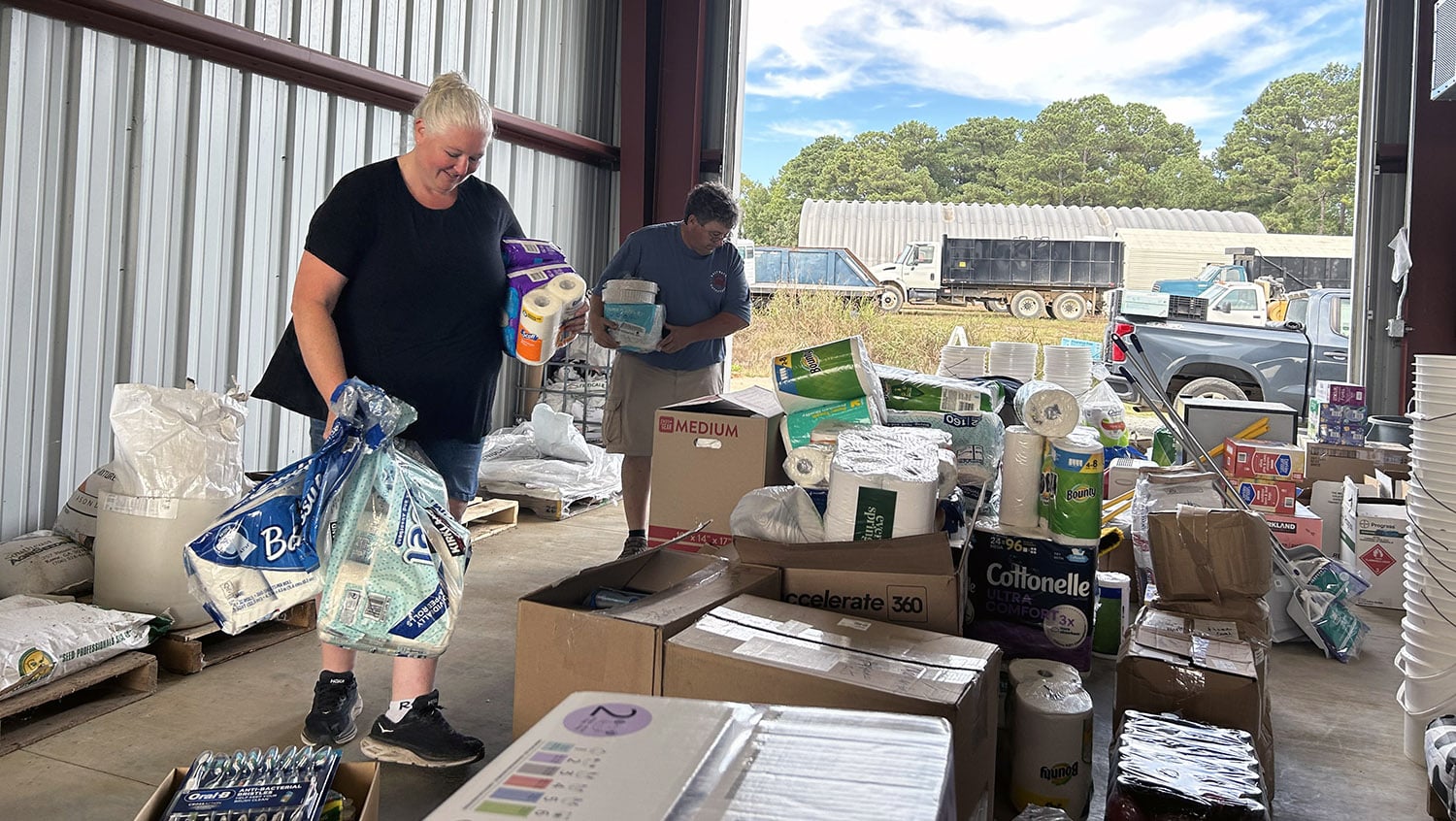 Bridget and Shep Lassiter organize donations at the Lake Wheeler Road Field Lab.