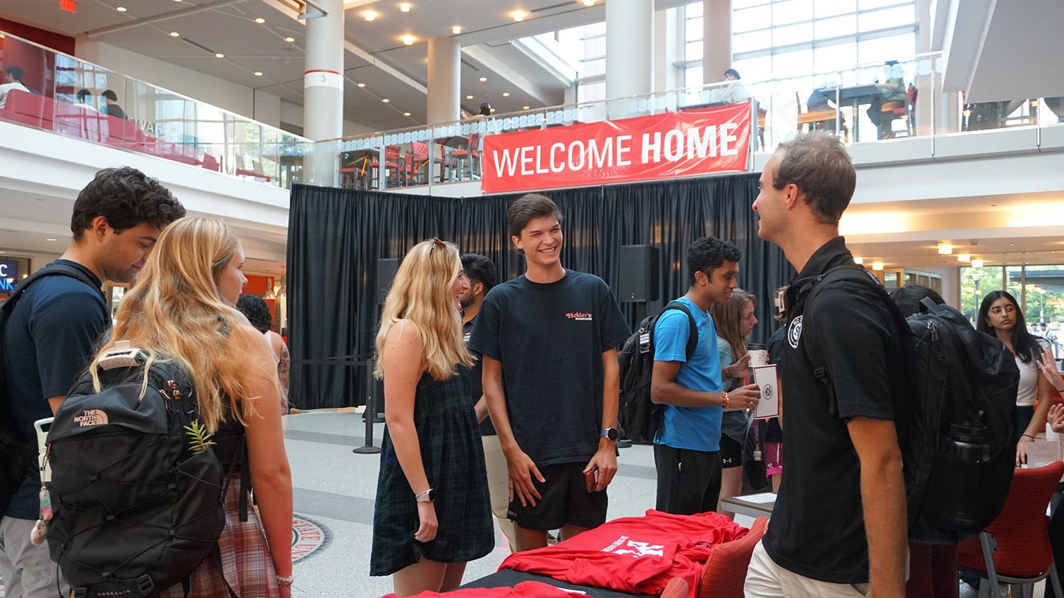 A view of the lobby in Talley Student Union shows members of Student Government engaging with other students at a tabling event.