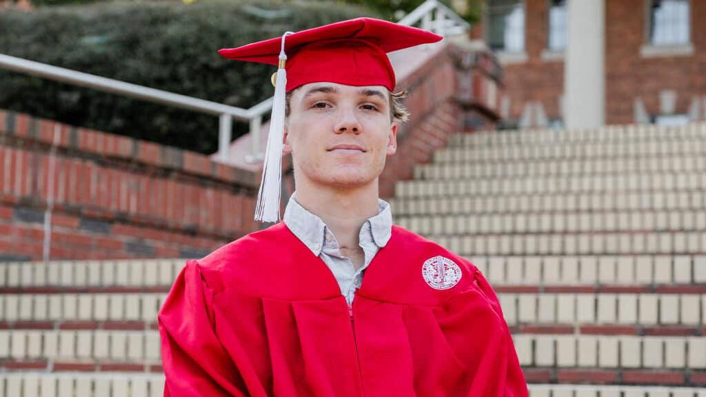 Fenderson in his commencement regalia on the Court of North Carolina