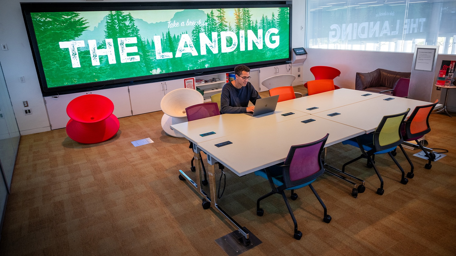 An employee works in The Landing, one of many unique sensory-friendly spaces in Hunt Library.