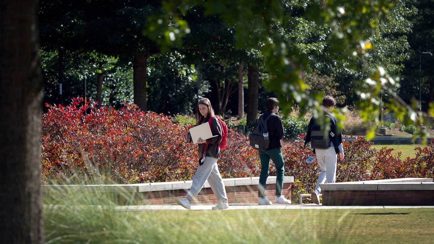 Students walk past Stafford Commons and the Talley Student Union on their way to and from class on a fall afternoon.