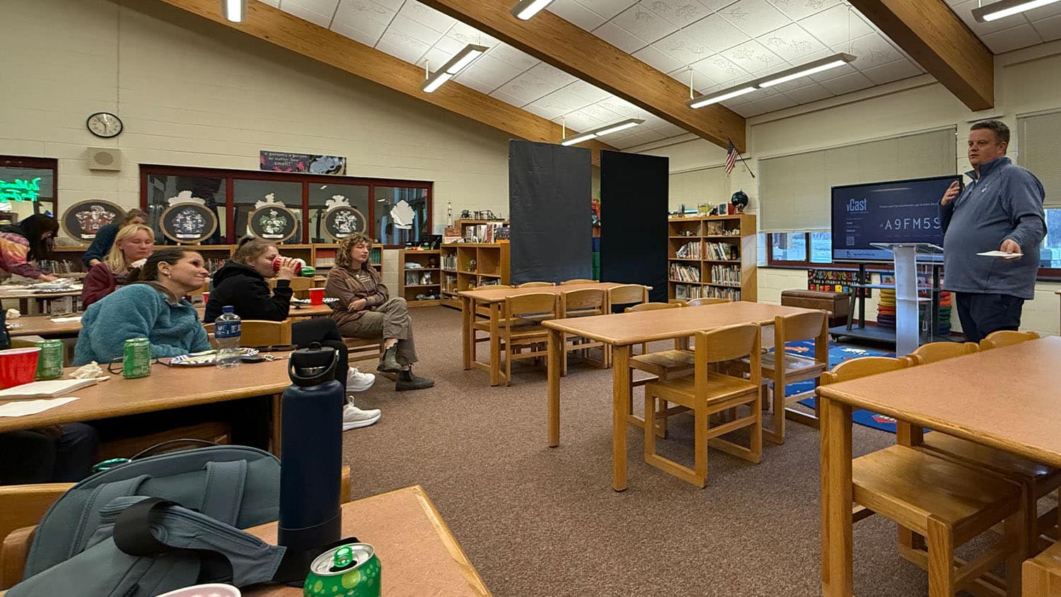 Banner Elk Elementary School principal Justin Carver speaks with NC State students at a community center in western North Carolina.