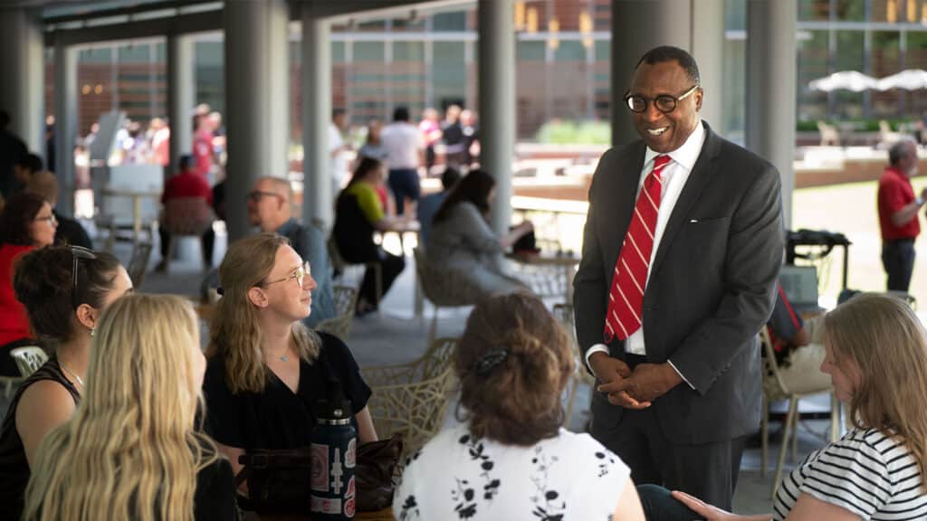 Howell meets with faculty and staff — and horses — at an employee appreciation event Wednesday.