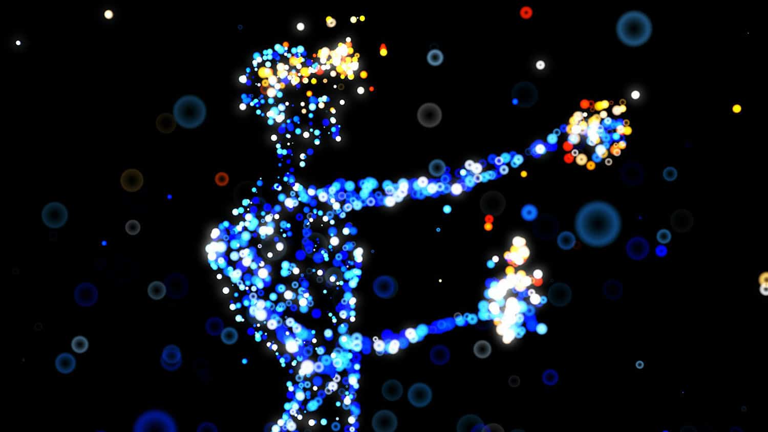 multicolored pixels in the shape of a person using a VR system stand in silhouette against a black background