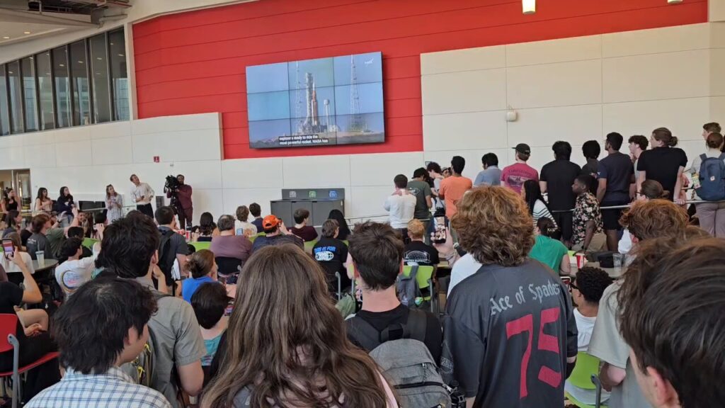 The NC State community watches the mission launch on a screen in Talley Student Union on April 1.